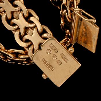 ARMLÄNK, 18k guld, Erik Wahlbeck, Stockholm, 1947. Vikt 38 g.