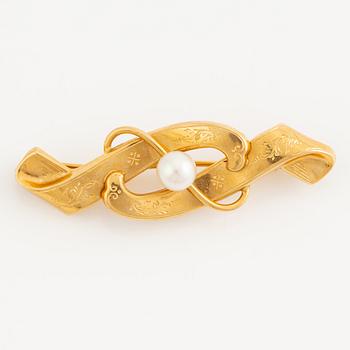 Brooch 18K gold with a cultured pearl.