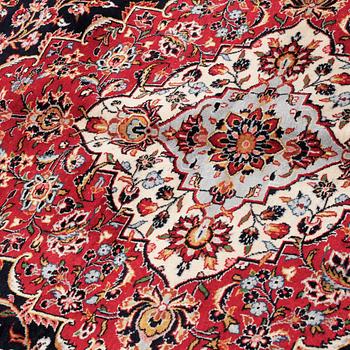 A Keshan rug, 402 x 302 cm.