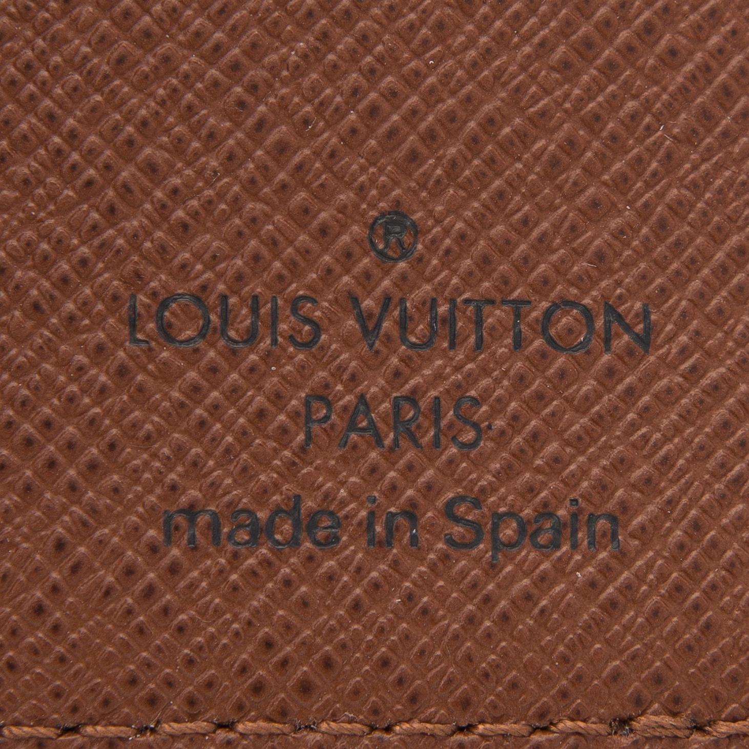 A Monogram Canvas Wallet / Card Holder.
