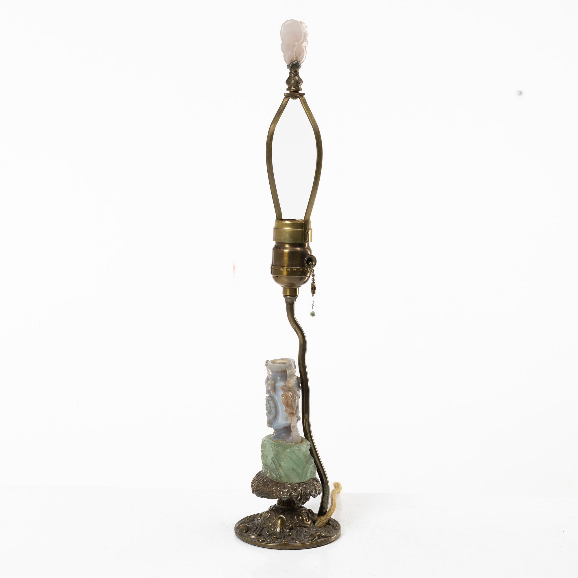 A Chinese table lamp with a carved stone vase with cover, 20th century.