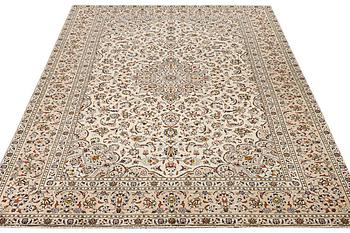 A Keshan carpet, c. 355 x 238 cm.