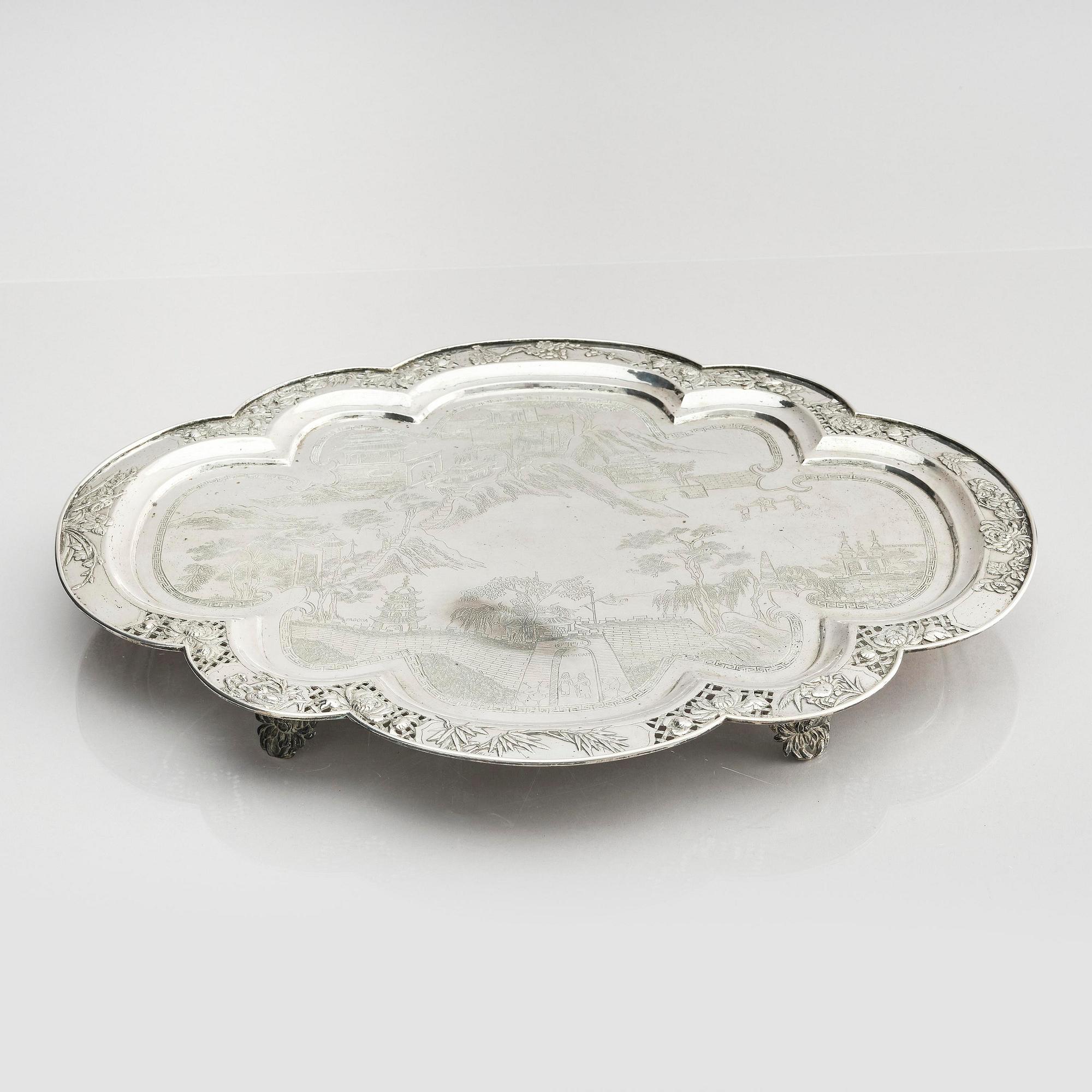 A lobed silver tray on four feet, Shanghai, Singfat, China Trade.