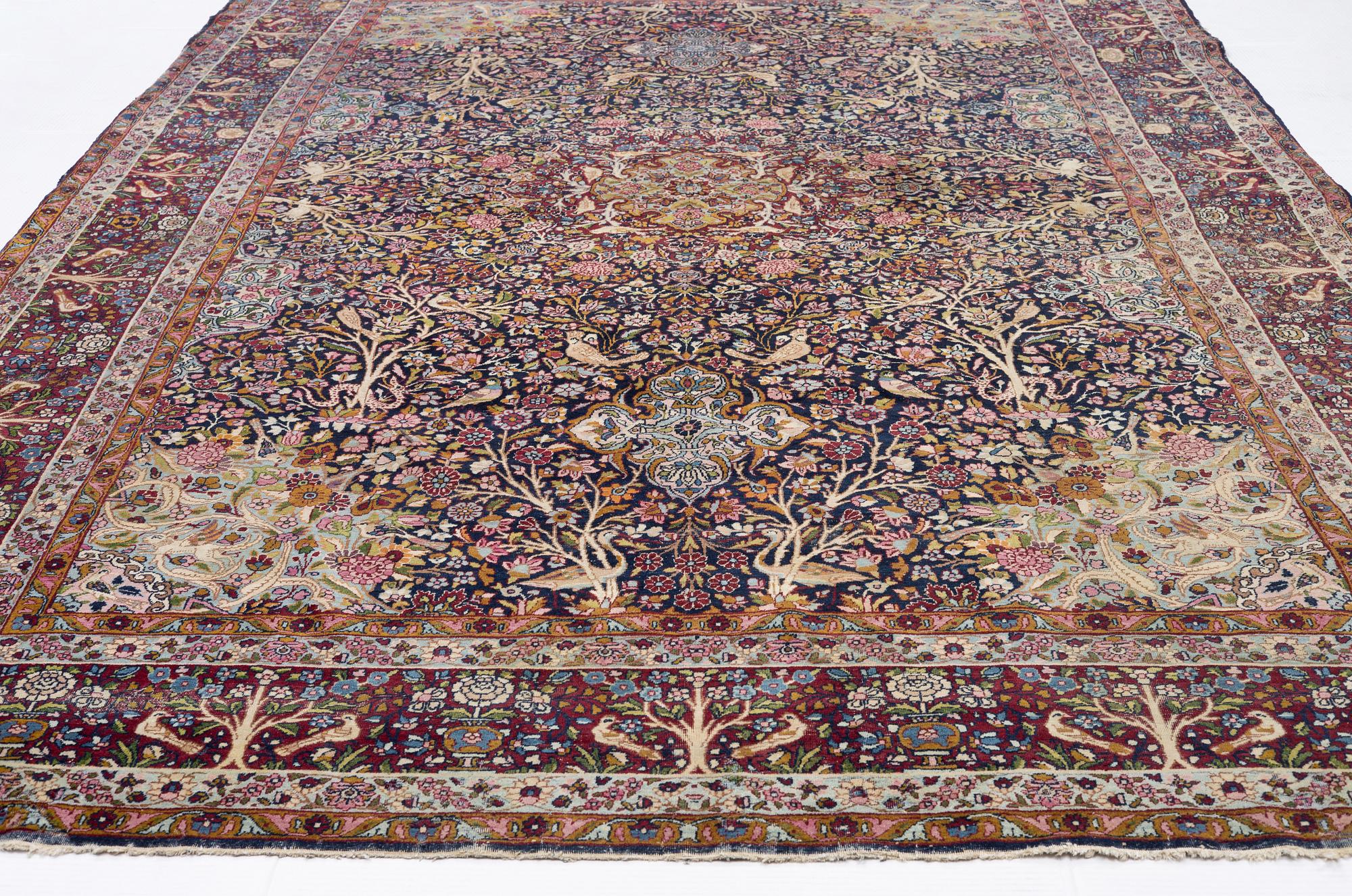 A carpet, Antique/semi-antique Kerman, ca 340 x 220 cm.