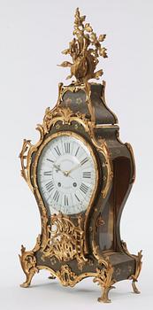 A Louis XV 18th century mantel clock.