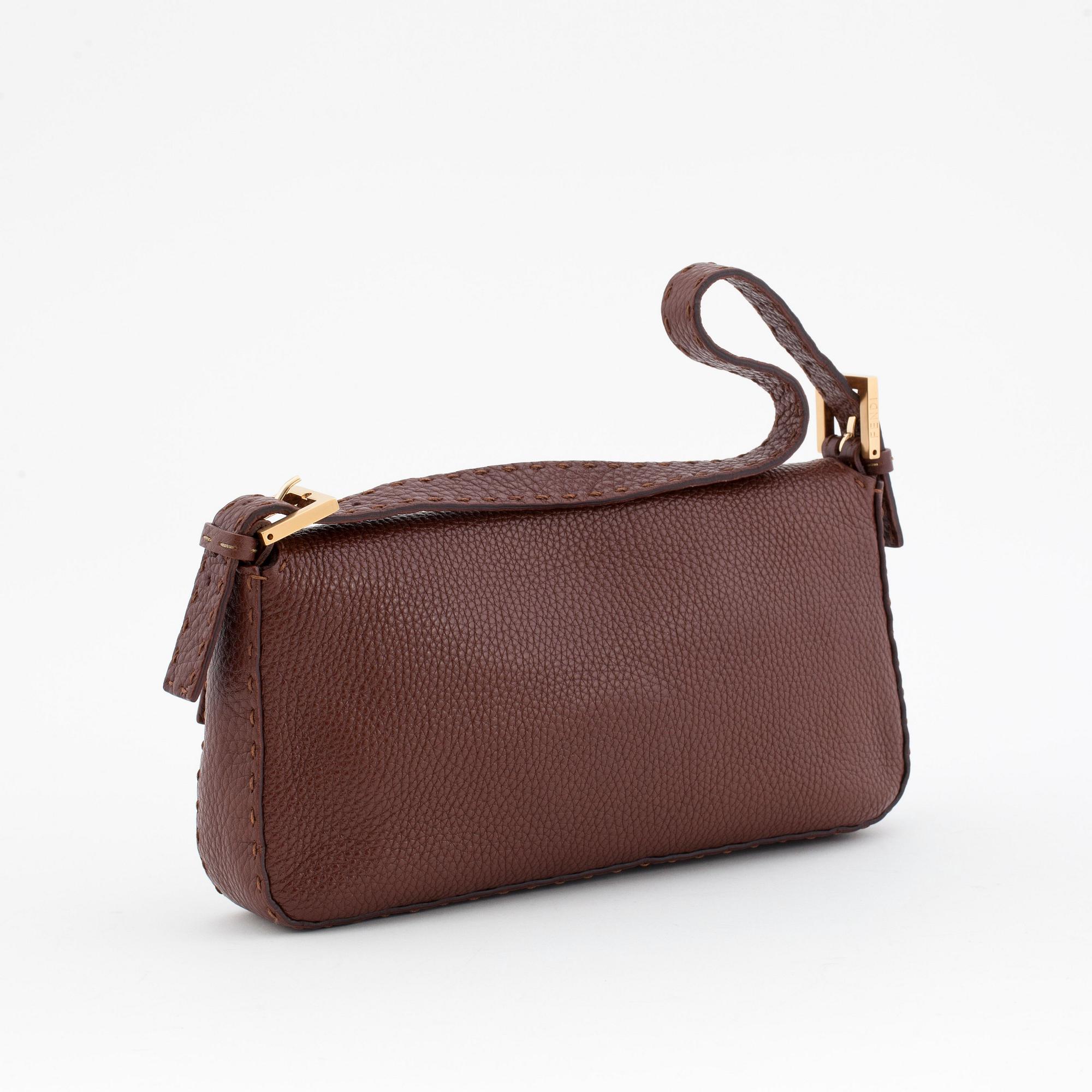 FENDI, a brown leather shoulder bag, "Baguette".