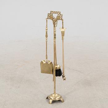 A late 20th century English brass fire tools.