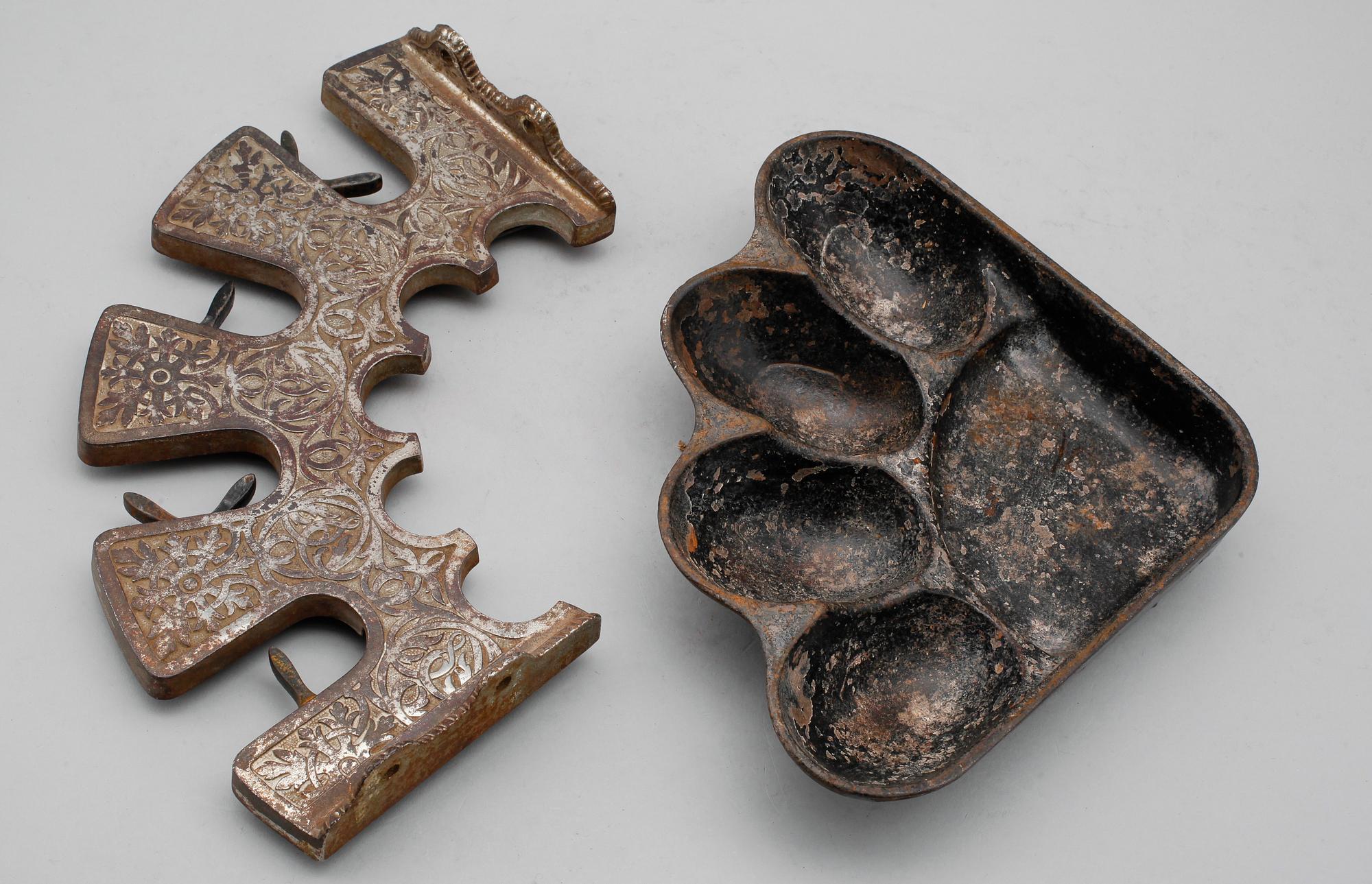 PARAPLYSTÄLL, gjutjärn och vitmetall, omkring år 1900.