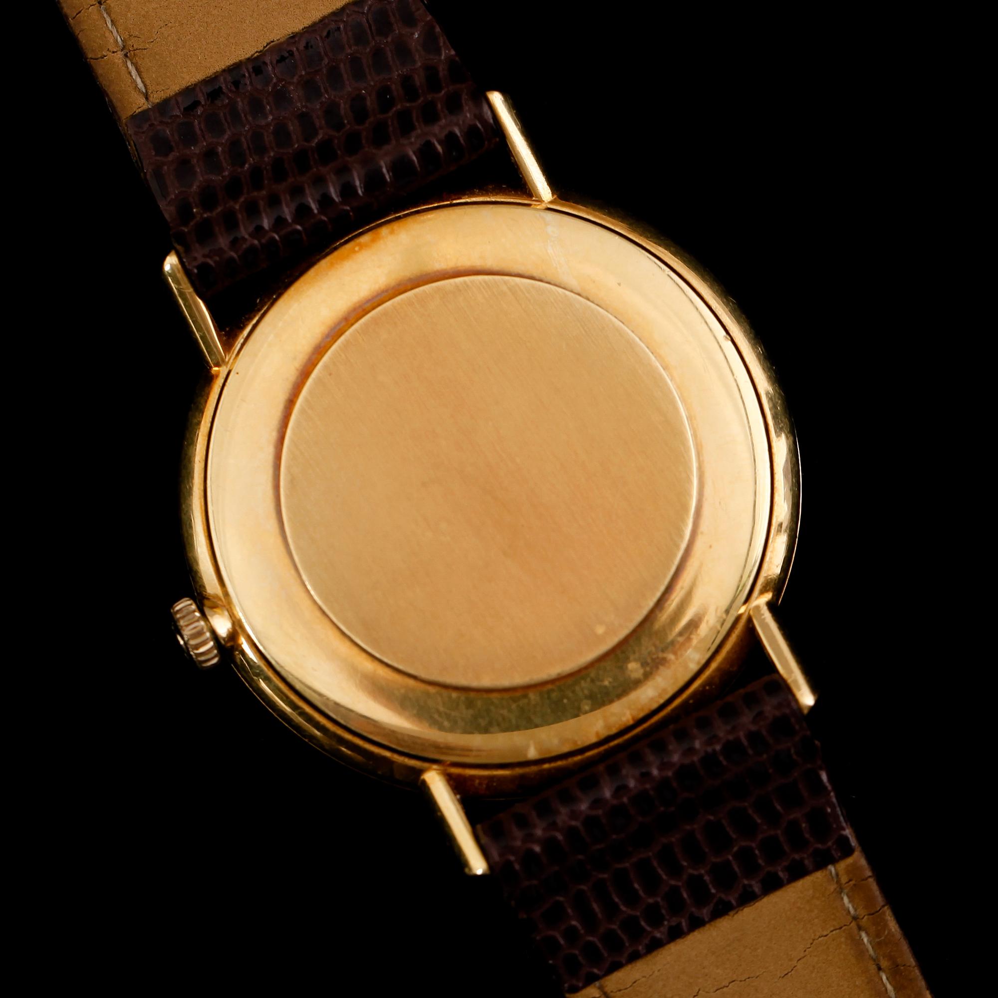 ARMBANDSUR, 18 k guld, Omega.