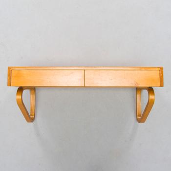Alvar Aalto, konsol / hylla modell 114 för O.Y. Huonekalu- ja Rakennustyötehdas A.B. 1900-talets mitt.