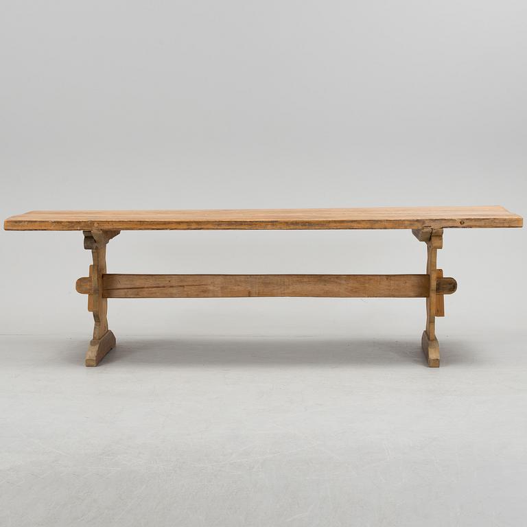 A 20th century pine table.