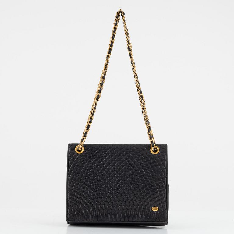 Bally, a quilted black leather bag.