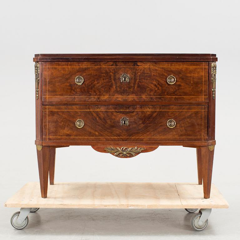 A gustavian style chest of drawers, late 19th century.