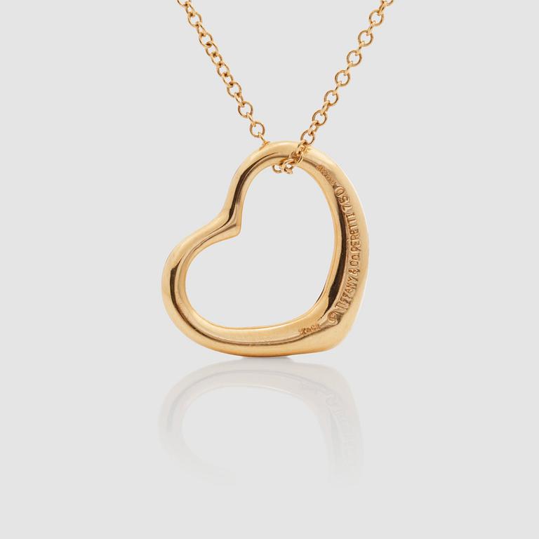 An 'open heart pendant' by Elsa Peretti for Tiffany & co.