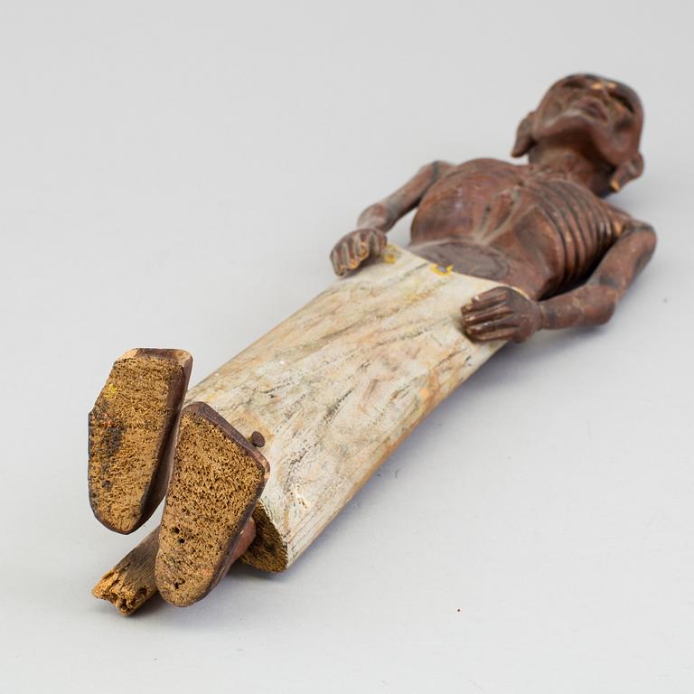 A wooden sculpture of a indian man, early 20th Century.