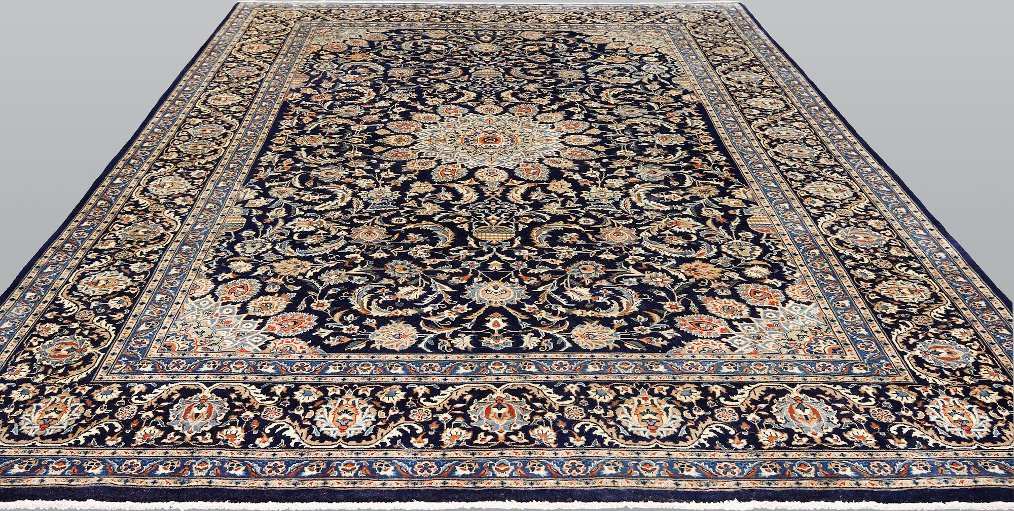 A Kashmar carpet, ca 340 x 253 cm.