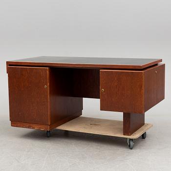 A stained desk, 1940's.