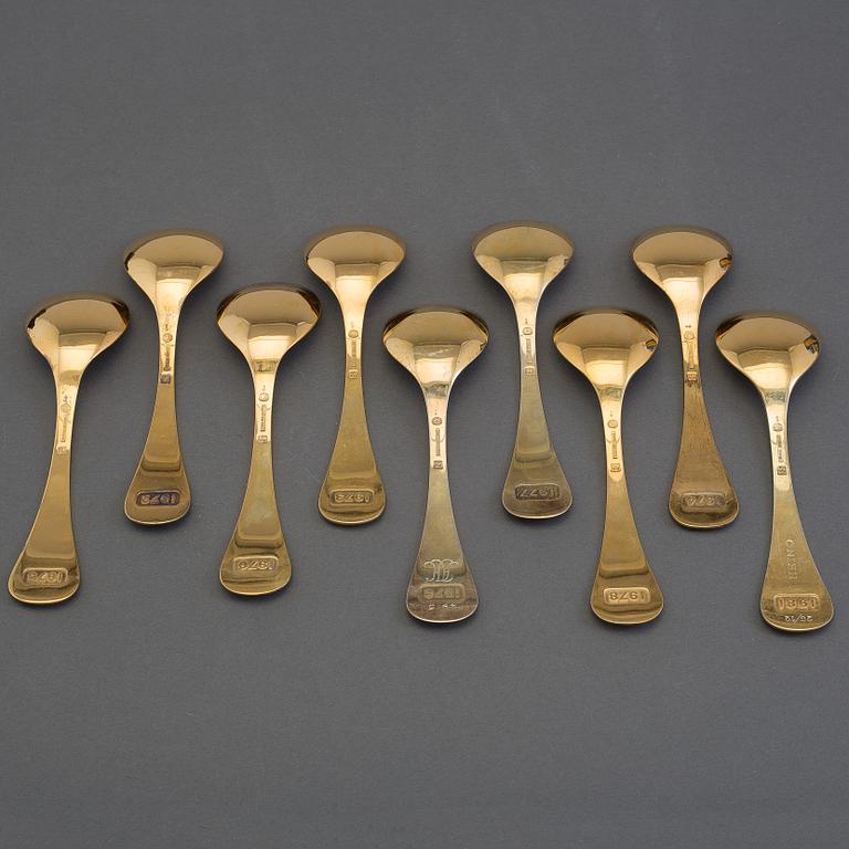 A collection of 23 gold plated sterling silver year/Christmas spoons, Georg Jensen, Copenhagen Denmark, 1972-1986.