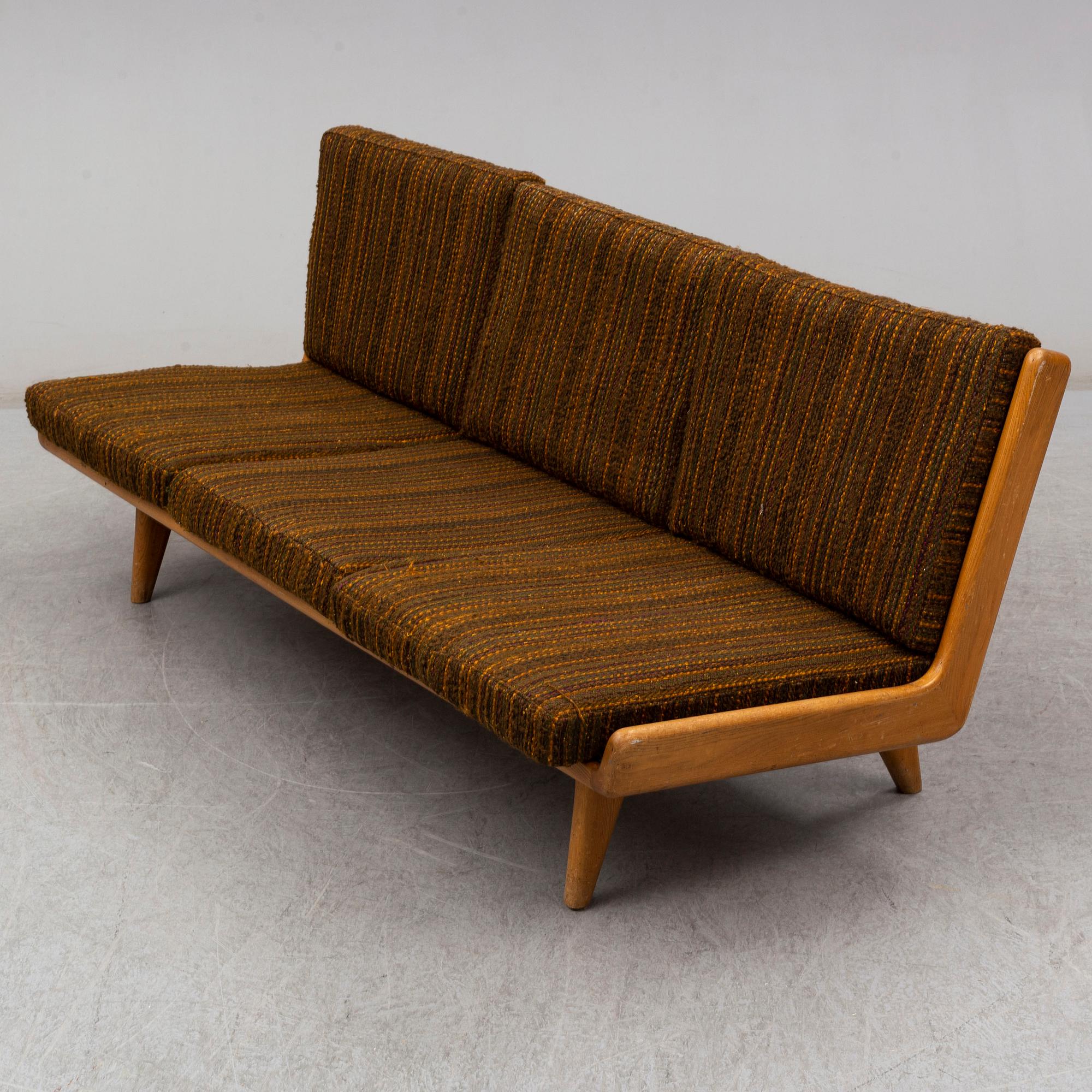 CARL GUSTAF HIORT AF ORNÄS, an oak 'Studio' sofa from Puunveisto Oy - Träsnideri Ab, designed in 1954.