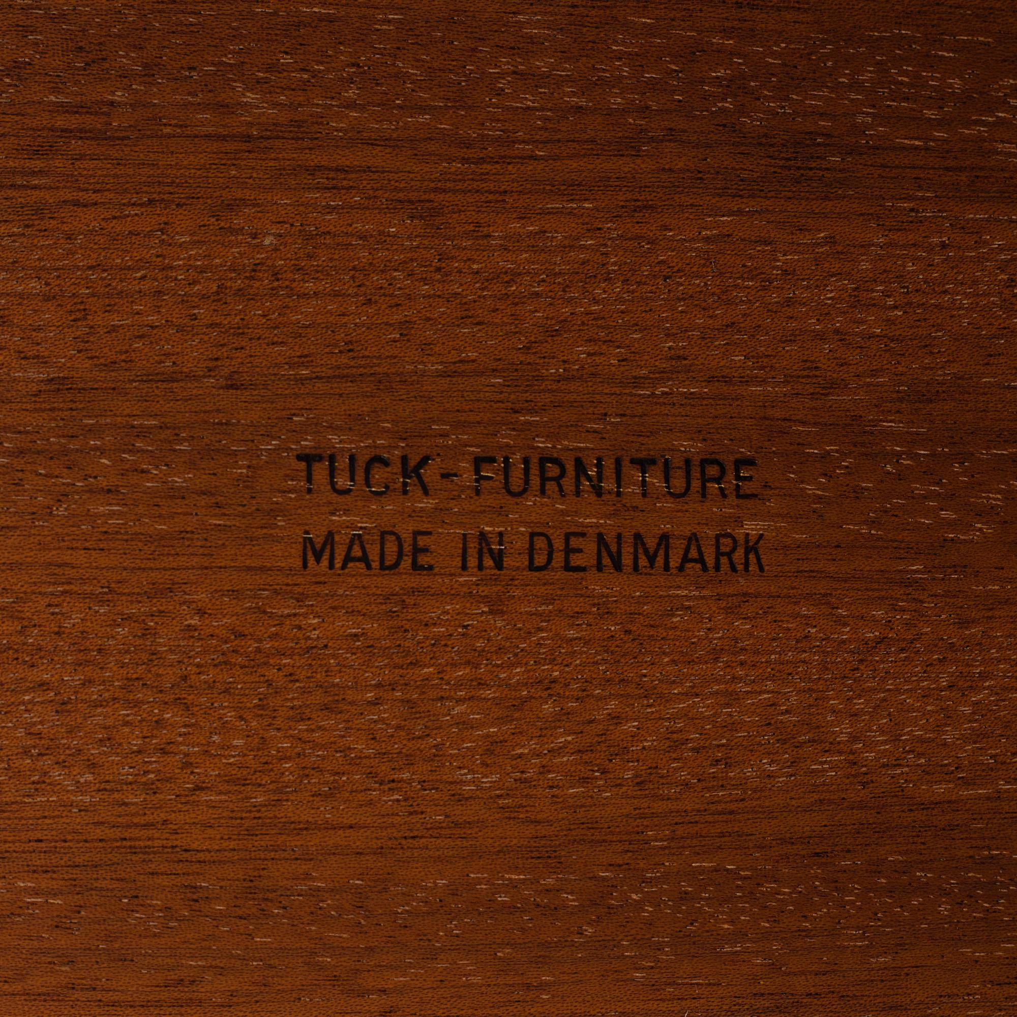 A Hans J Wegner serving trolley veneered with teak.
