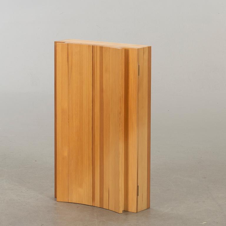 OLOF PIRA, A PINEWOOD WALL CUPBOARD DESIGN OLOF PIRA.