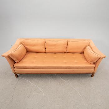 A 20th century three-seater sofa.