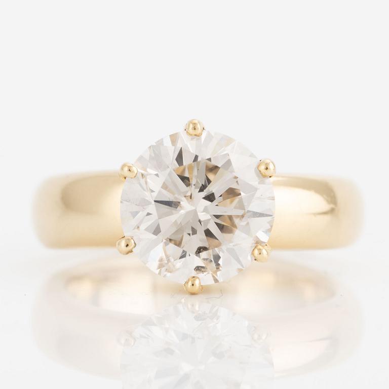 Ring, 18K gold with a round brilliant-cut diamond.