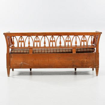 A late gustavian sofa from Lindome, made in early 19th century.