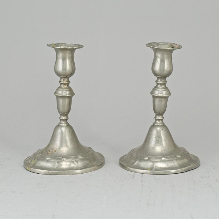 A pair of pewter candlesticks, Lars Claesson Fries, Strängnäs (1760-90).