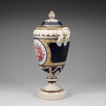 A large Berlin vase with cover, 19th Century.