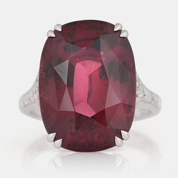 1290. A rhodolite garnet and diamond ring.