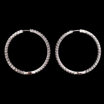 A pair of diamond, 2.64 cts in total, earrings.