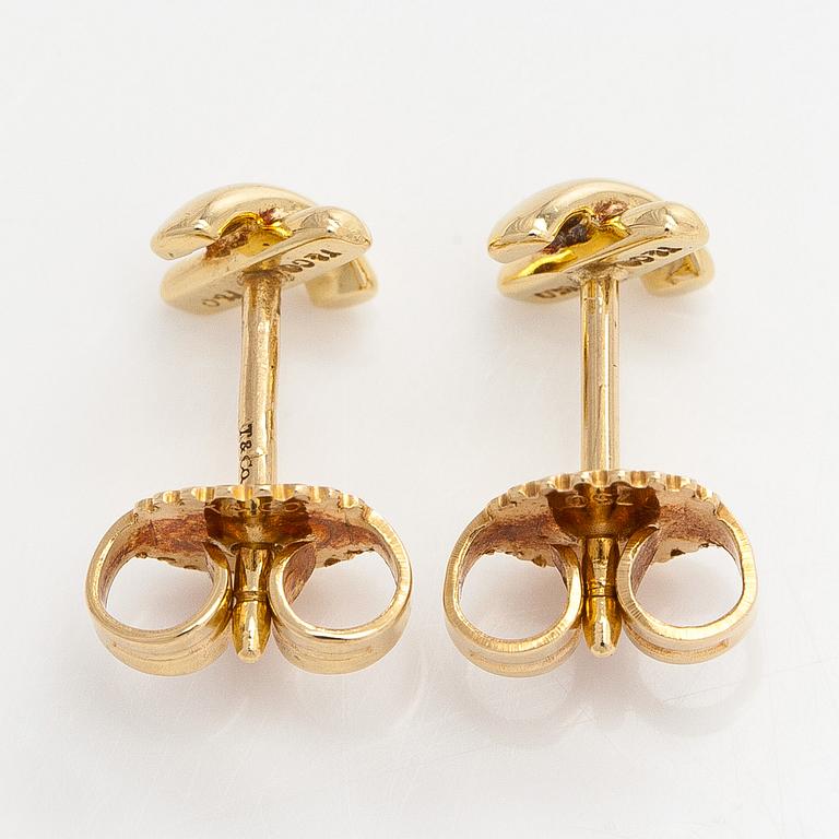 Tiffany & Co, a pair of 18K gold 'Cross Stitch' earrings.