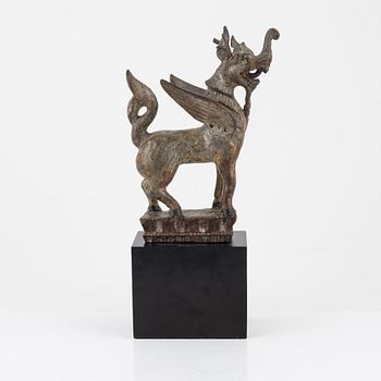 A wooden sculpture of a mythical best, Thailand, 20th Century.