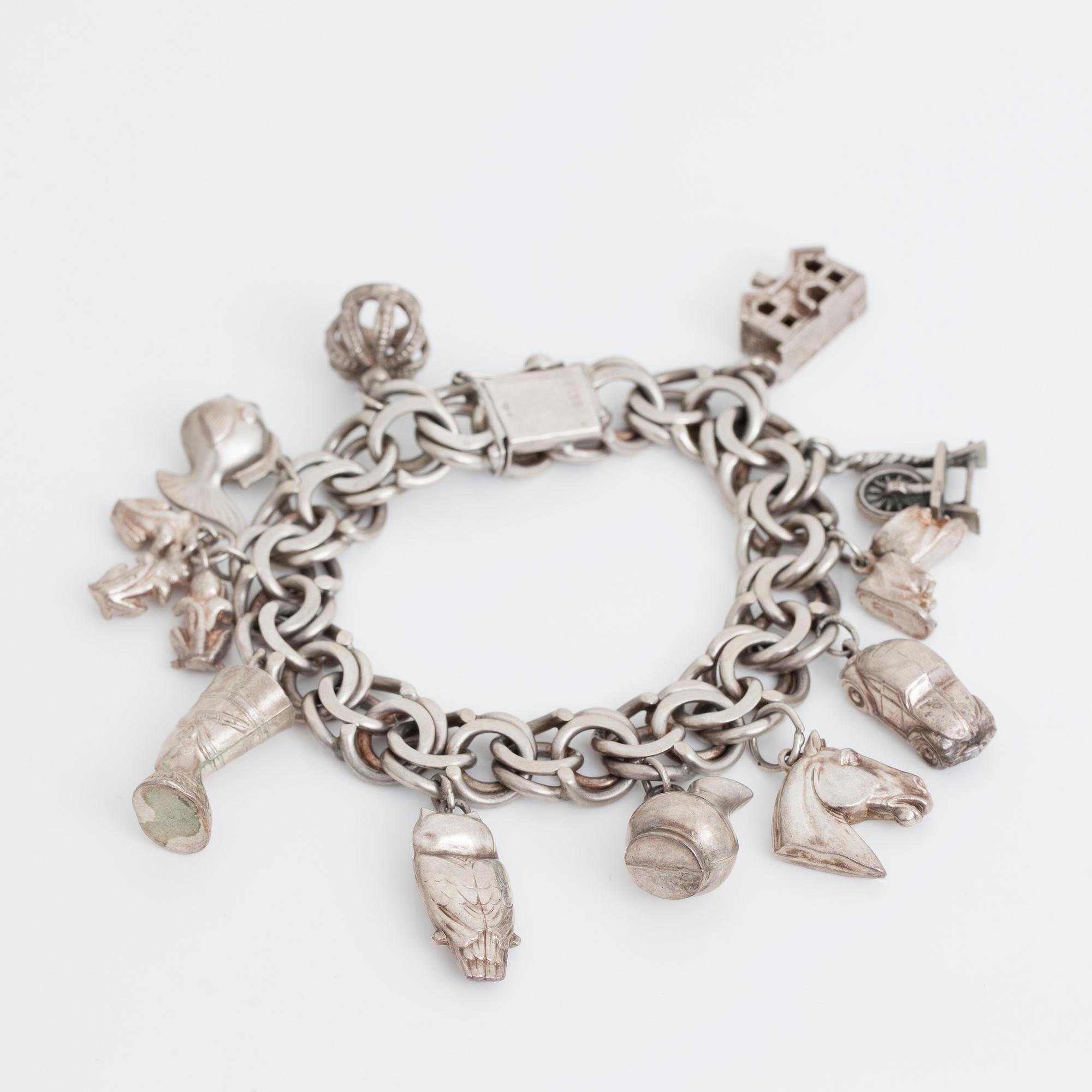 BERLOCKARMBAND, silver, 1900-talets andra hälft.