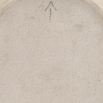 Birger Kaipiainen, a decorative stoneware plate signed Kaipiainen Arabia Finland.
