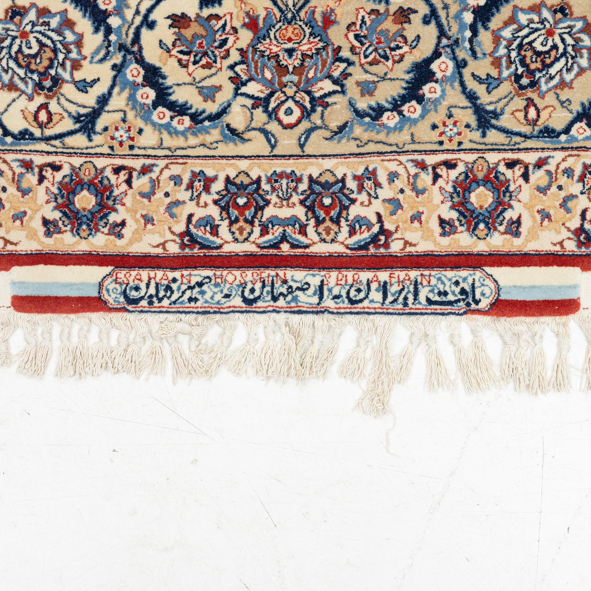 A Isfahan rug, signed (Hossein) Seirafian  222 x 150 cm.