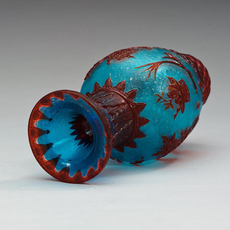 A Chinese red, blue and gold splashed Peking glass vase, 20th Century.