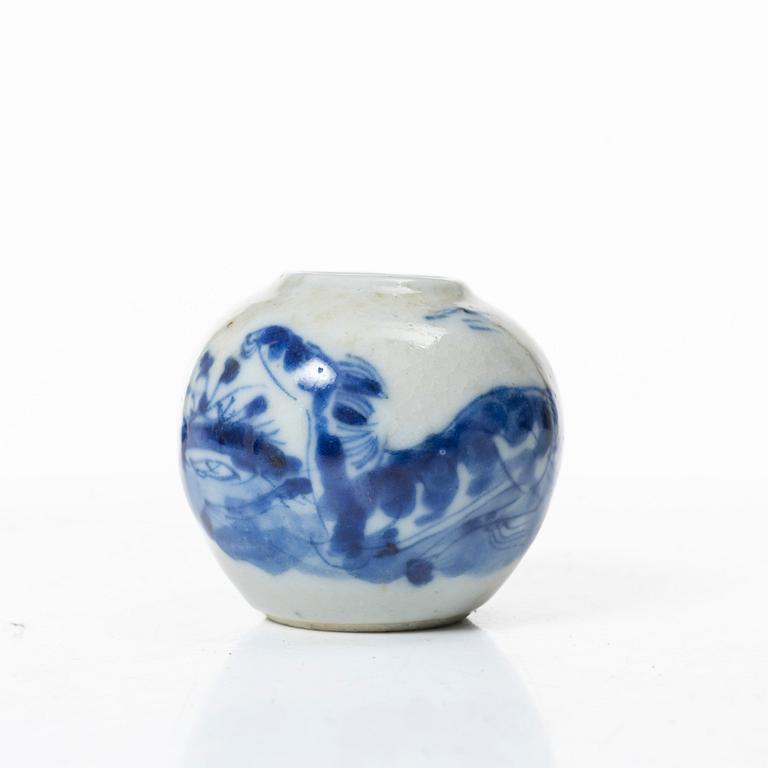 A Chinese blue and white porcelain brush washer / vase and a metal and tortoise shell nail guard, Qing dynasty.