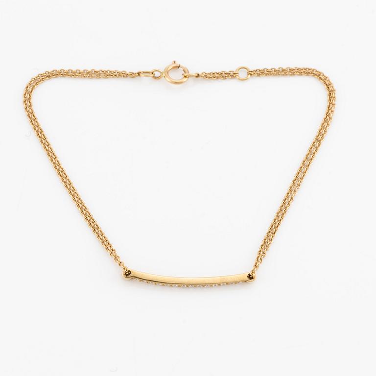 Armband, 18K guld med små briljantslipade diamanter.
