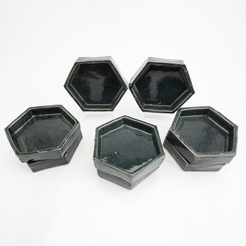 Signe Persson-Melin, a set of eight stonware plates.