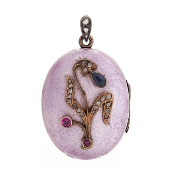 A medallion/pendant in 14K gold, silver, guilloché enamel and gemstones, Russia, first half of the 20th century.