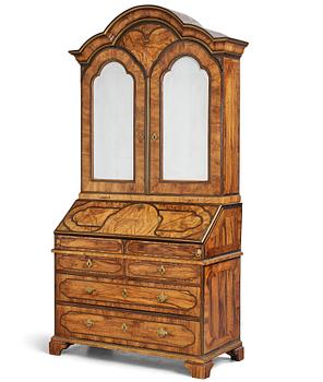 3. A late Baroque walnut veneer cabinet, mid 18th century.