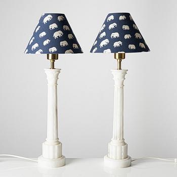 A pair of alabaster table lamps, 20th century.