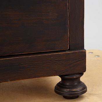 A chest of drawers, circa 1900.