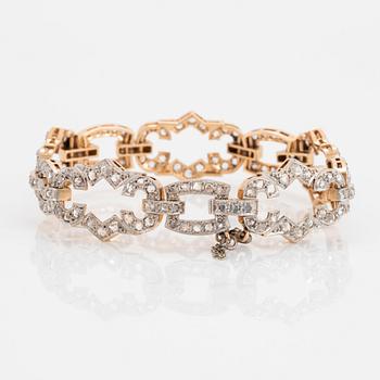 A 14K gold and platinum bracelet set with rose-cut diamonds.