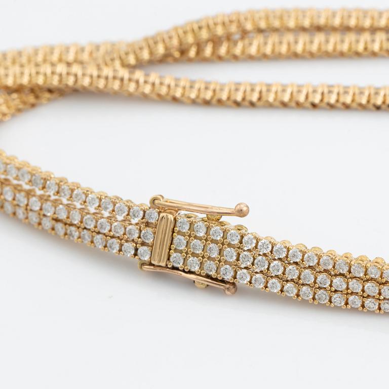 Brilliant cut diamond three strand bracelet.