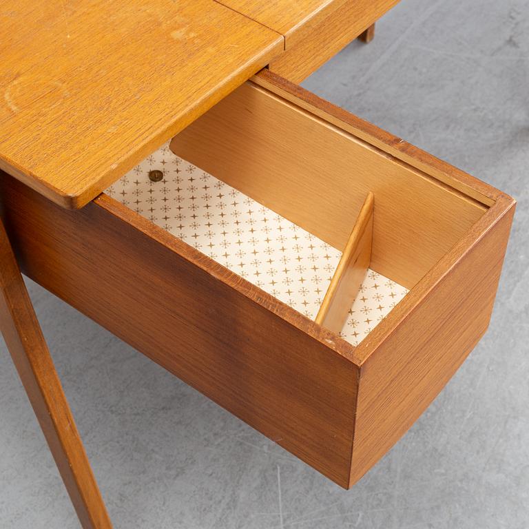 A 1960's teak dressing table.