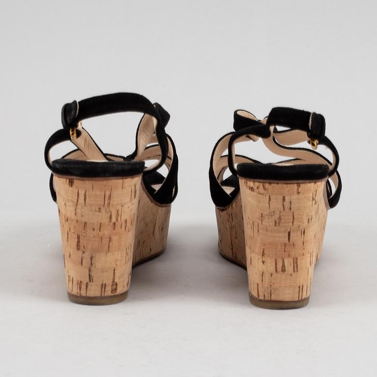 Prada, a pair of black suede wedge sandals, size 39½.