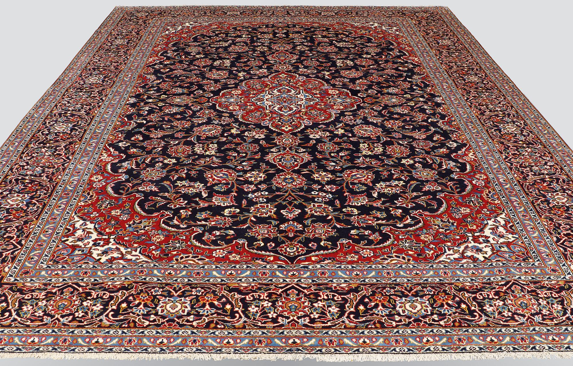 A carpet, Kashan, ca 424 x 304 cm.